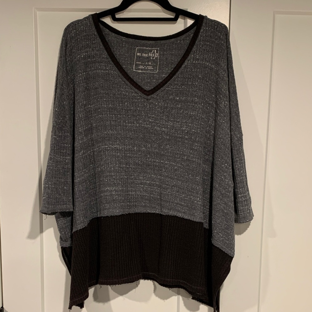 Free People "We the Free" oversized Waffle Knit Top in a grey and black design